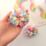 Par de pompons de fita - Imagem 2