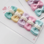 Mini laço com pérolas